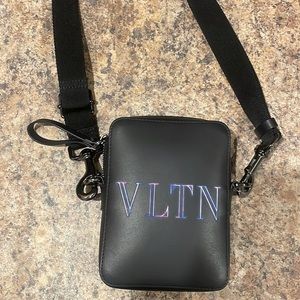 Valentino Garavani Mini Black bag with neon VLTN Logo